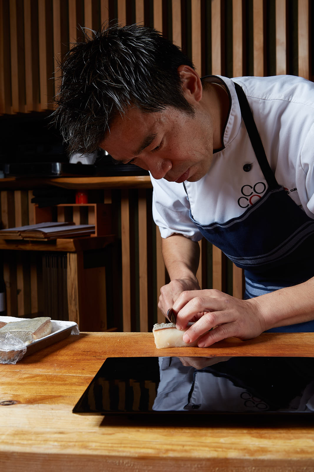 Japanese Chef cutting sushi 1